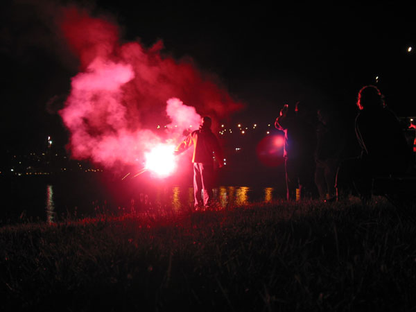 Red handflare on fire, Auckland, New Zealand