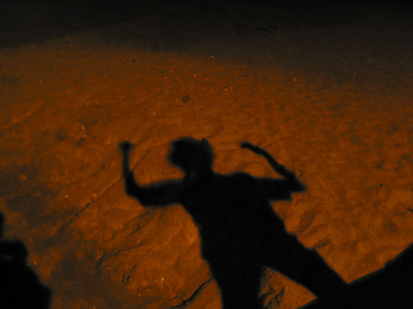 A shadow of a guy on sand, Auckland, New Zealand