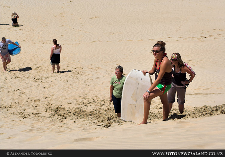 Climbing the giant sand dunes, 90 Mile Beach, New Zealand