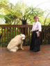 An aikidoka boy with a dog