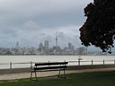 A bench in Devonport with sea and Auckland views