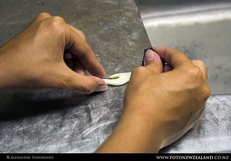 Bone carving nearly finished, Rangitukia, New Zealand