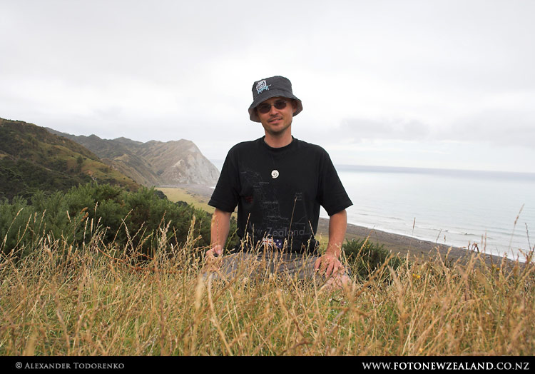 Alex on the top of the hill, Rangitukia, New Zealand