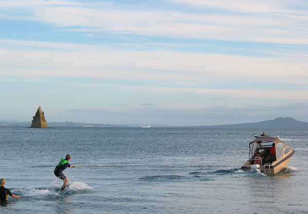 Water ski at Matakatia Bay, Whangaparaoa Peninsula, Auckland, New Zealand