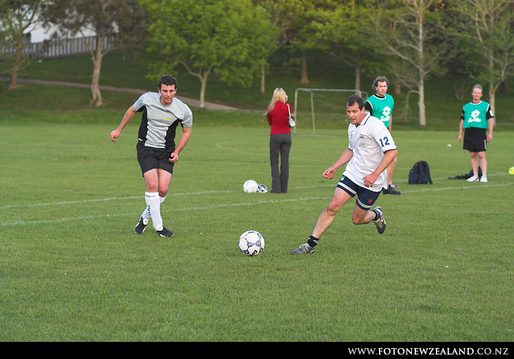 Football and lady in red, Sunnynook Park, Auckland, New Zealand