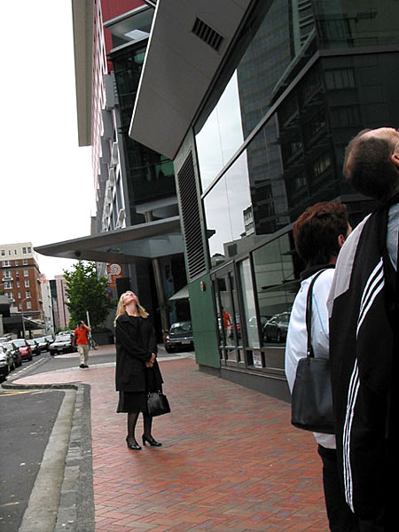 A woman observing Sky Jump in Auckland, Auckland, New Zealand