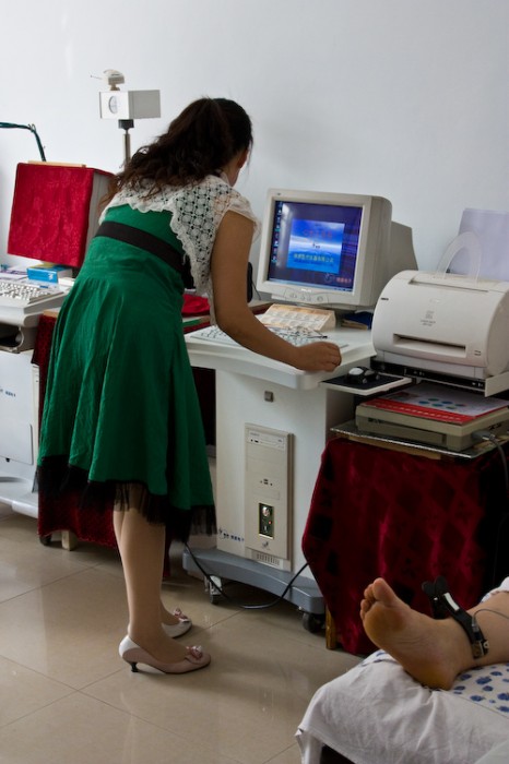 Chinese doctor with a patient in Wudalianchi