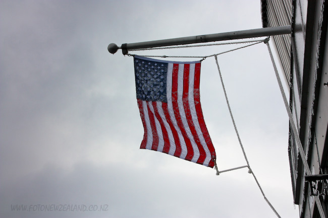 Iced American flag at the observation deck of the Empire State Building