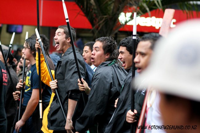 Young Maori perform haka at hikoi in Auckland